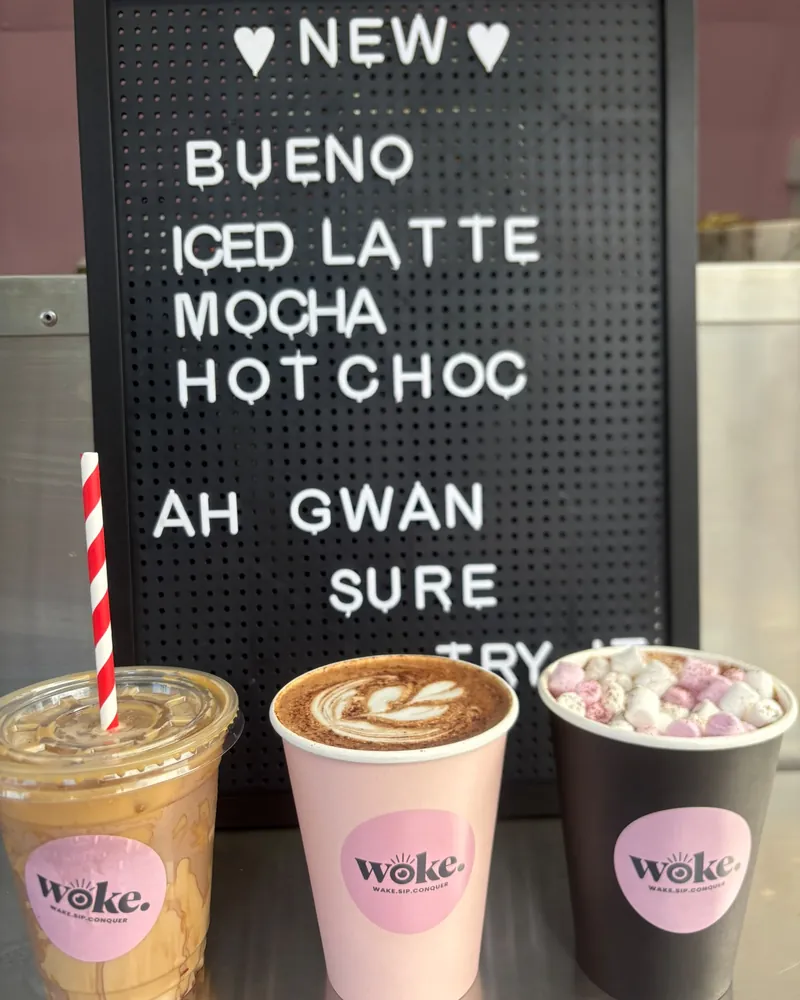 Letterboard reading New Bueno iced latte, mocha, hot choc